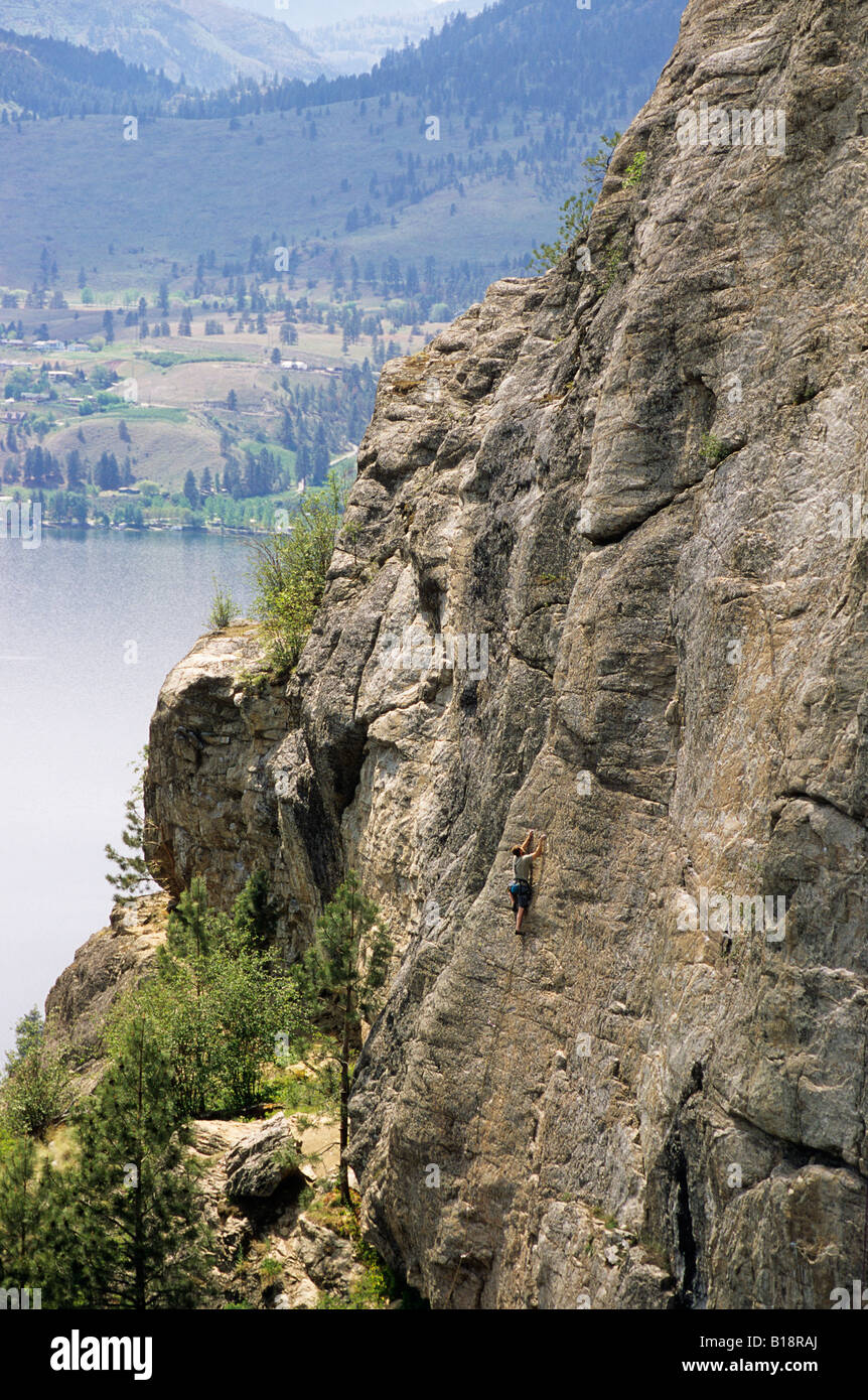 Man climber on Bubbles and the Beanstalk, 5.11. The Fortress. Skaha Bluffs. Penticton, British Columbia, Canada. Stock Photo