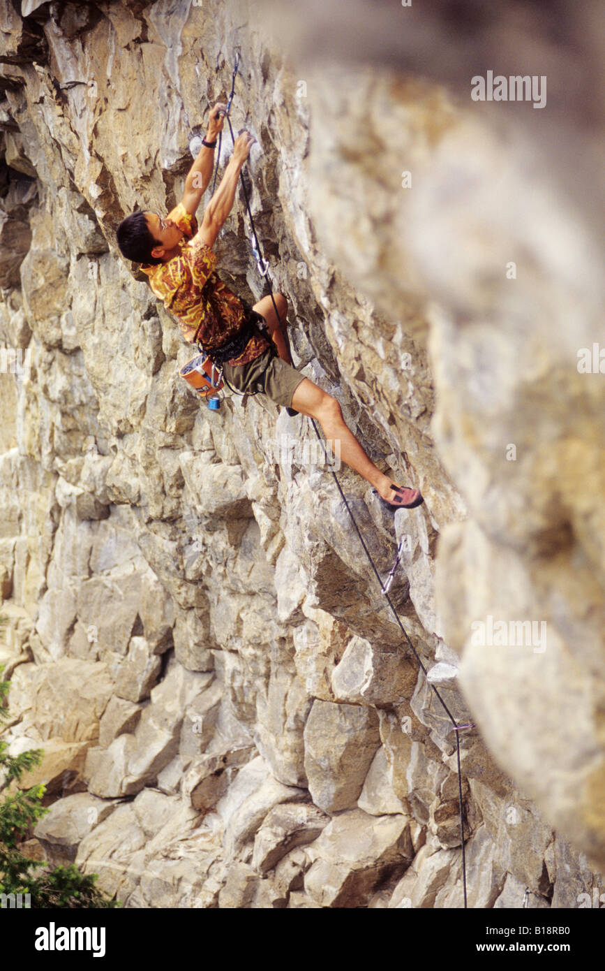 Man climbing Crestfallen, 5.12c. The Wave Wall. Skaha Bluffs. Penticton