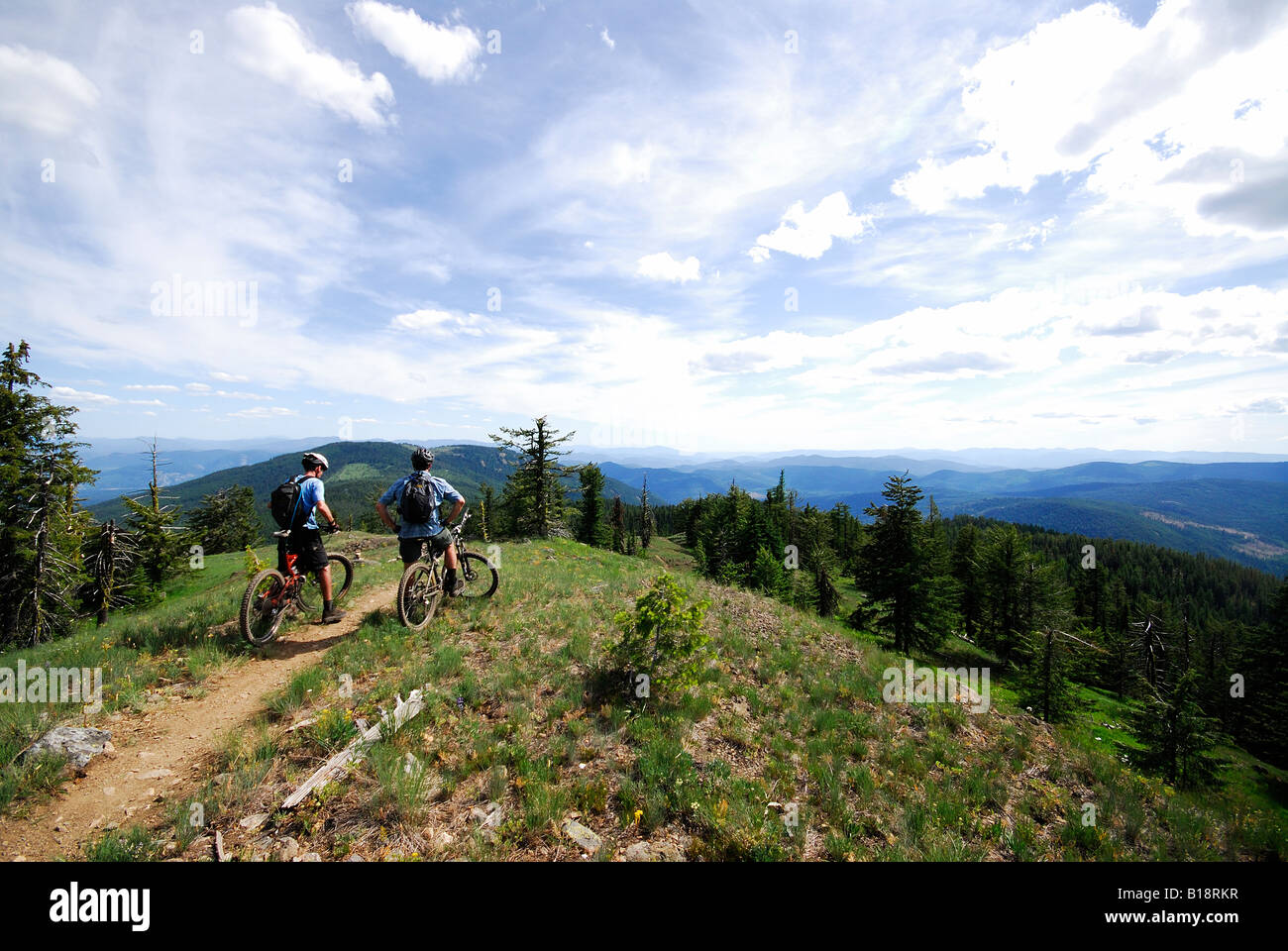 Men biking the seven summits trail hires stock photography and images
