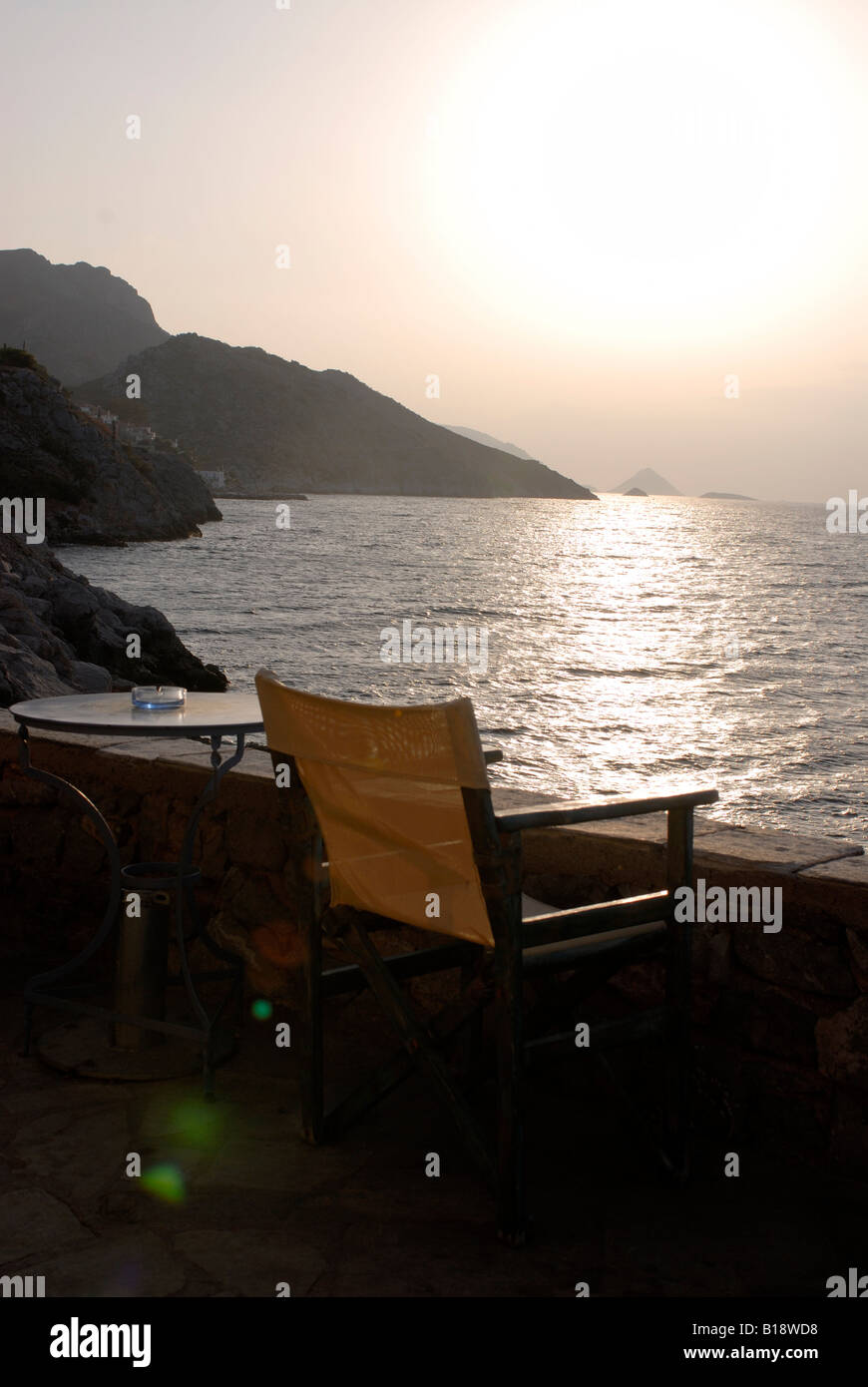 Lonely chair in a outdoor veranda, Hydra island,Greece Stock Photo