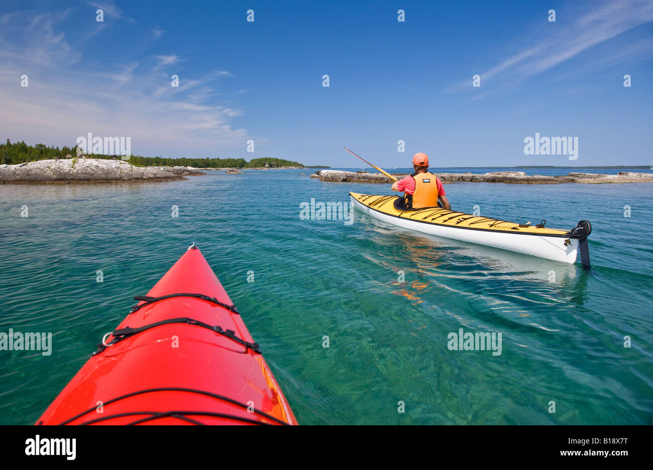Kayaking in Bay along Niagara Escarpment near Tobermory, Bruce