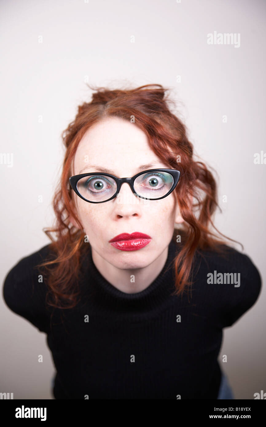 Staring woman with big red lips Stock Photo