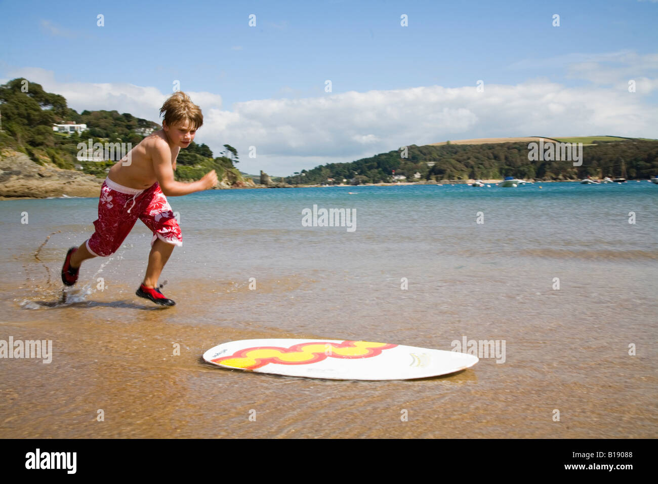 boy playing in the sea Stock Photo - Alamy