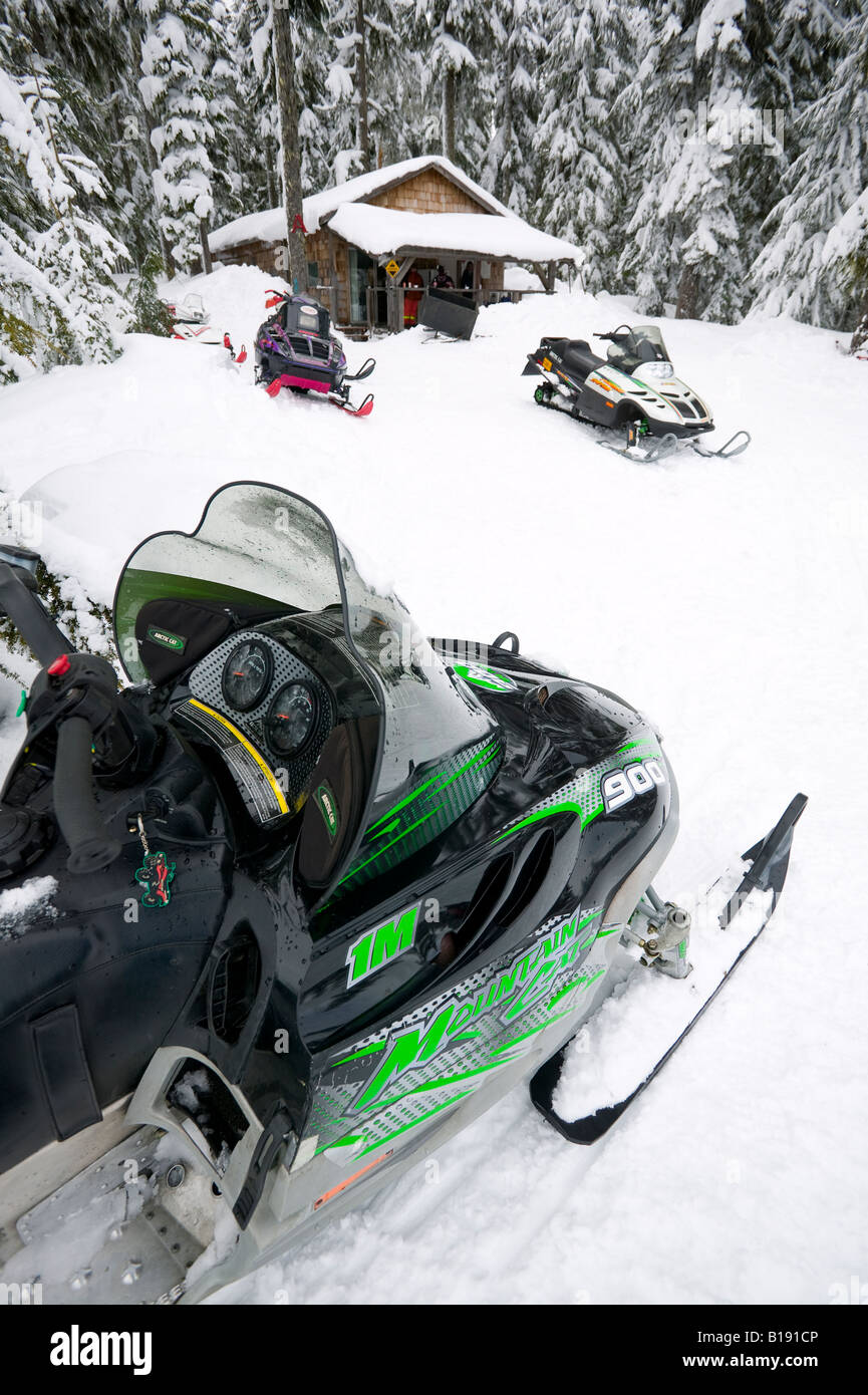 Snowmobiles outside of Snowmobiler's cabin, Campbell River, Vancouver