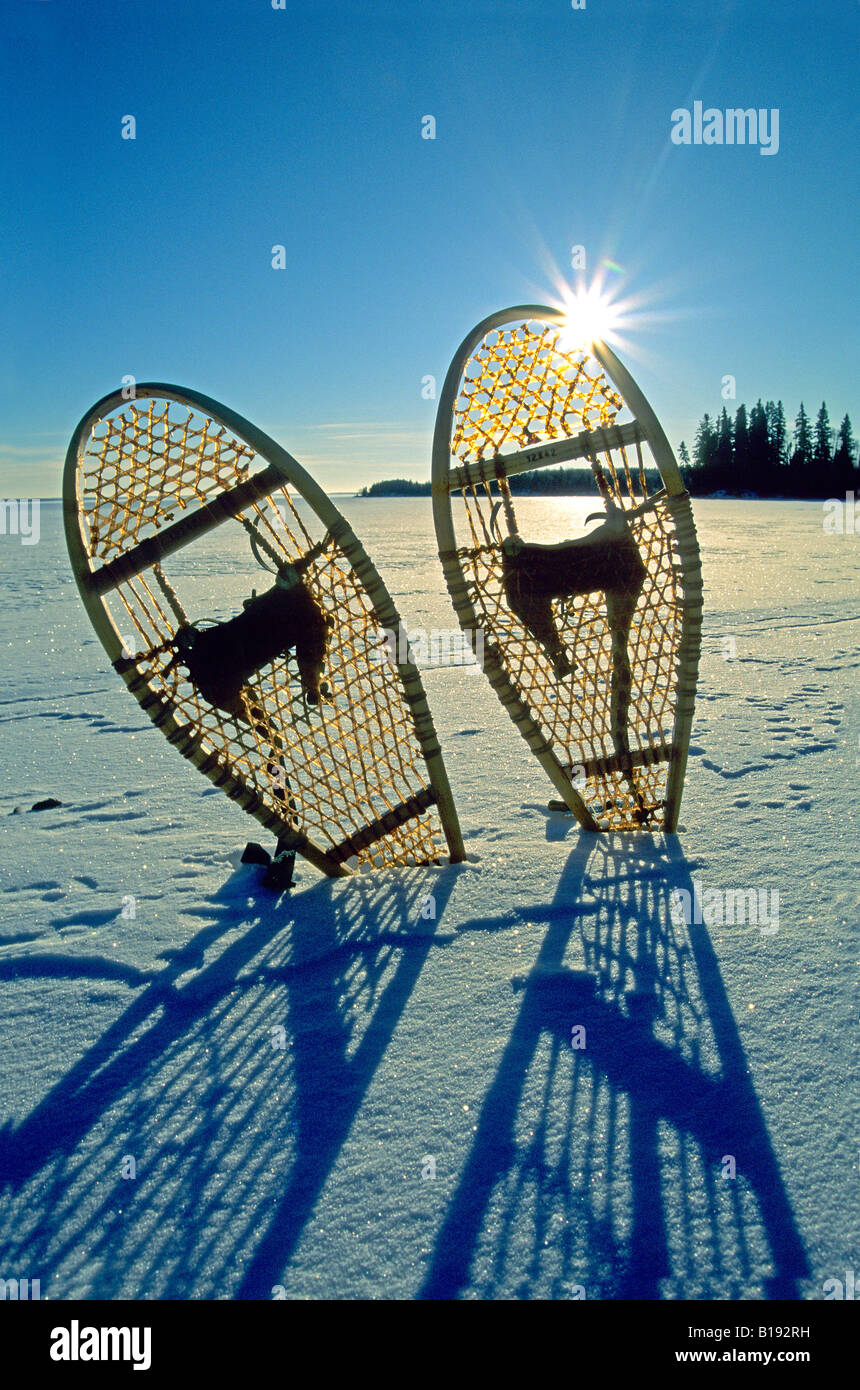Snowshoes on a frozen northern lake, Canada. Stock Photo