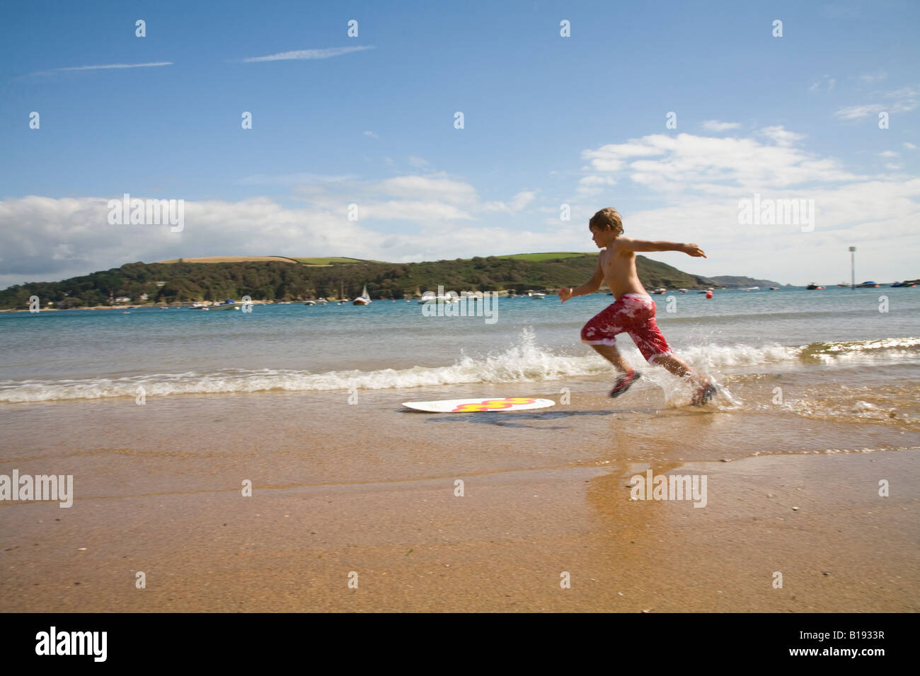 boy playing in the sea Stock Photo - Alamy