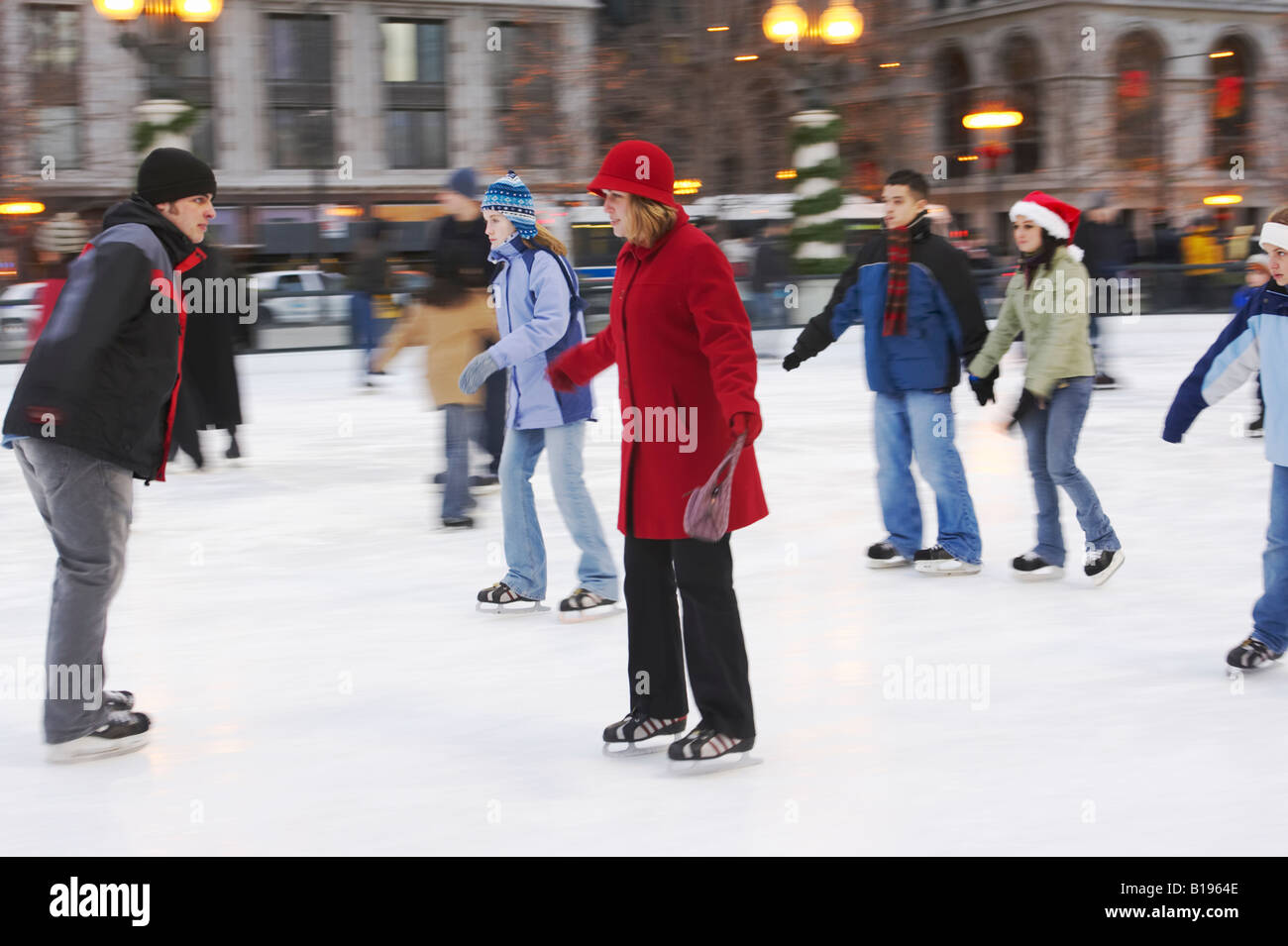 SKATING Chicago Illinois Ice skaters at Millennium Park ice rink winter