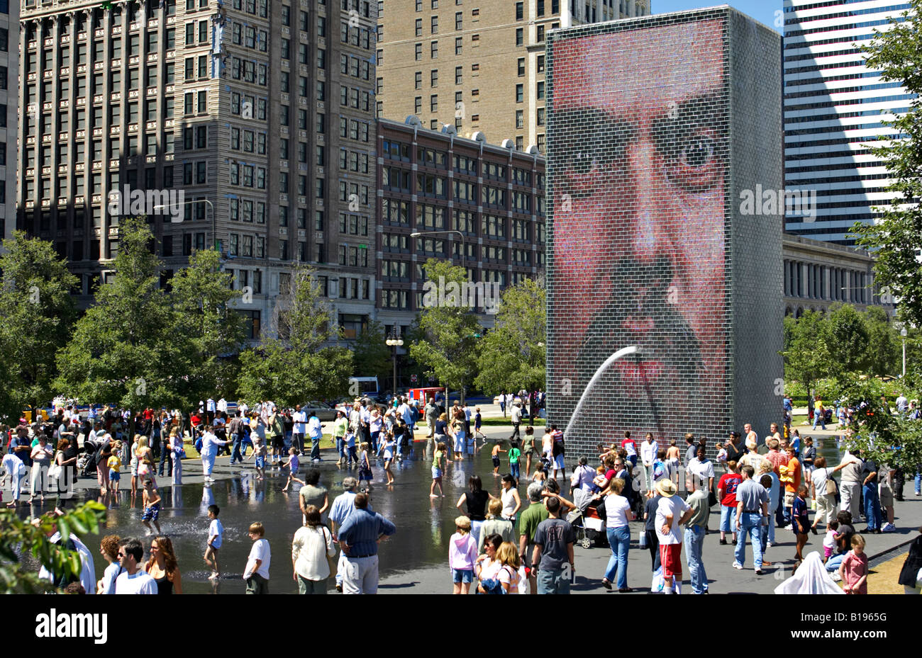 ILLINOIS Chicago Crown Fountain in Millennium Park faces on giant video screen Children and