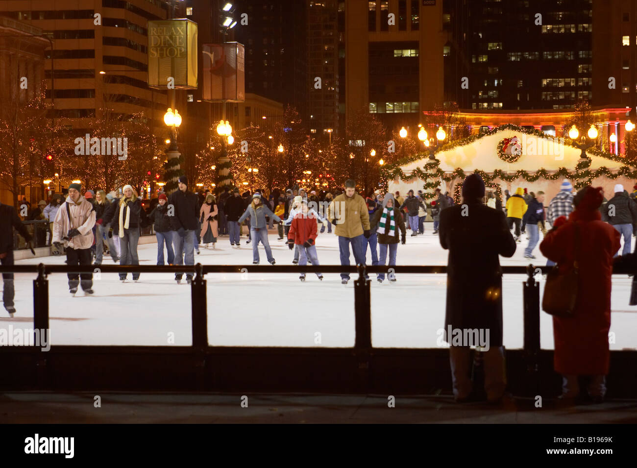 SKATING Chicago Illinois Ice skaters at Millennium Park ice rink winter