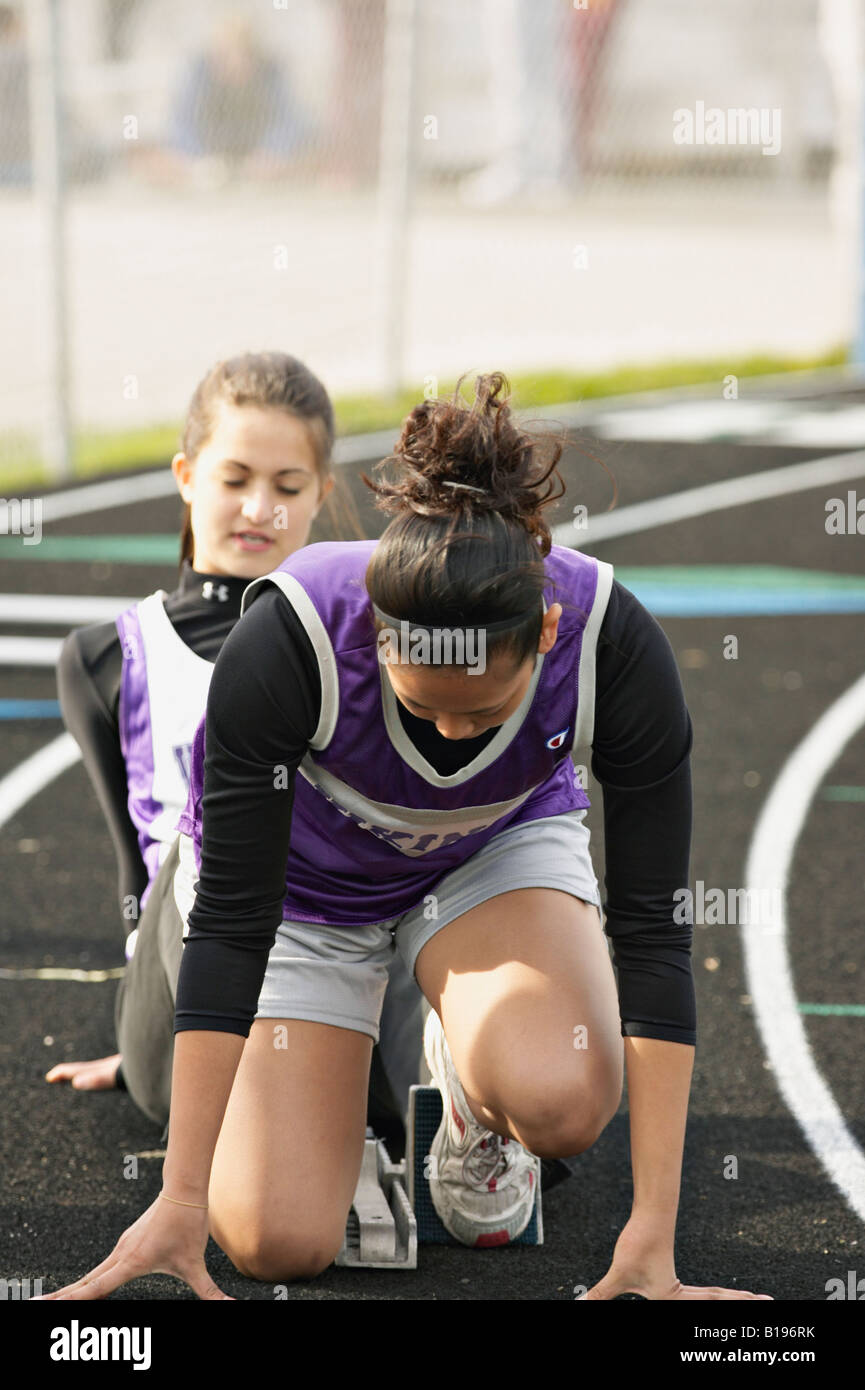 TRACK Glenview Illinois Girl in blocks High school girls track meet
