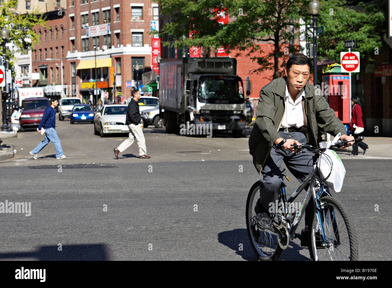 Chinese man in street hires stock photography and images Alamy