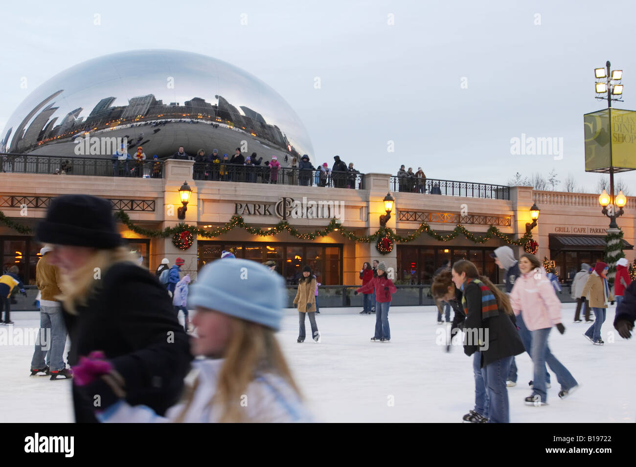 SKATING Chicago Illinois Ice skaters at Millennium Park ice rink winter