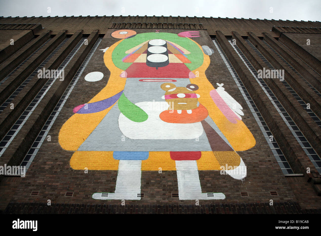 A work by Spanish artist Sixeart on the exterior of the Tate Modern building at Bankside, London. Stock Photo