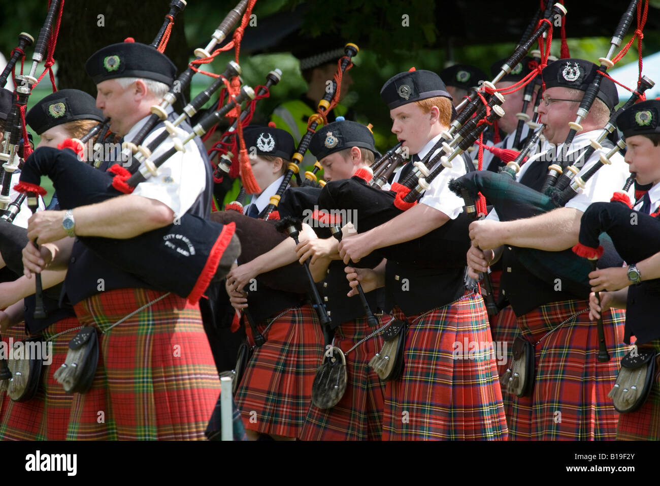 Scottish Marching pIpe Band, Drummers & pipers, musicians and performers at Glamis Castle, Scotland, UK Stock Photo