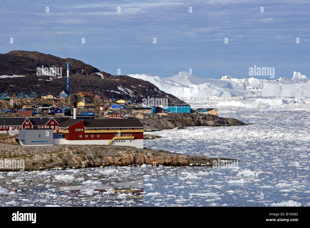 Greenland, Ilulissat, UNESCO World Heritage Site Icefjord.  The entrance to the port of the town showing scattered bergy bits. Stock Photo