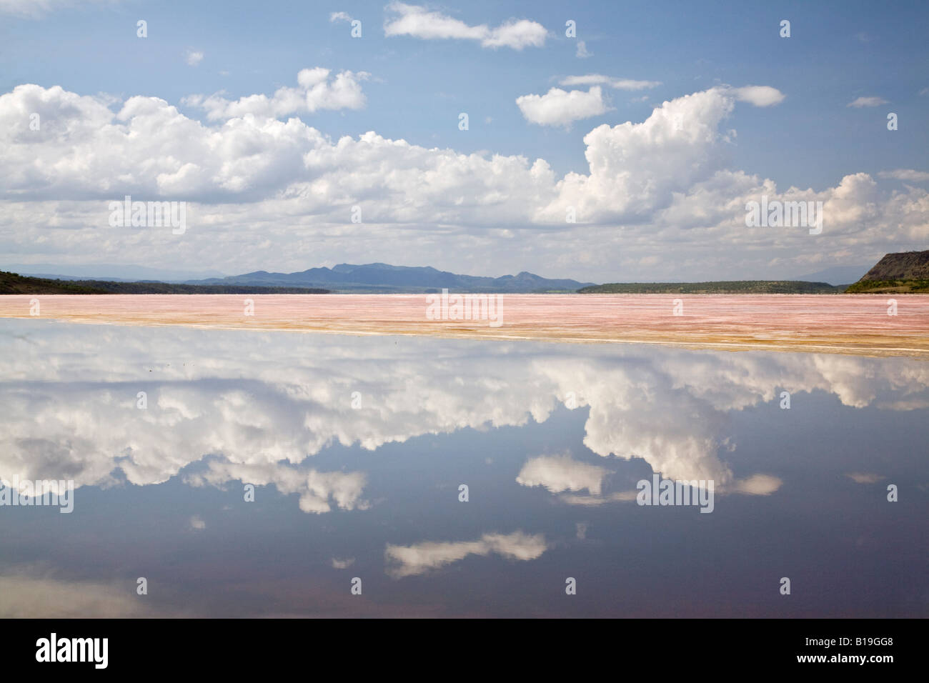 Kenya, Rift Valley. Lake Magadi with red trona or soda covering part of