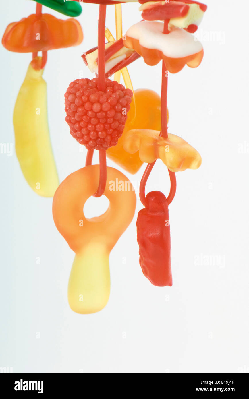 Colorful candy hanging on strings, closeup Stock Photo Alamy