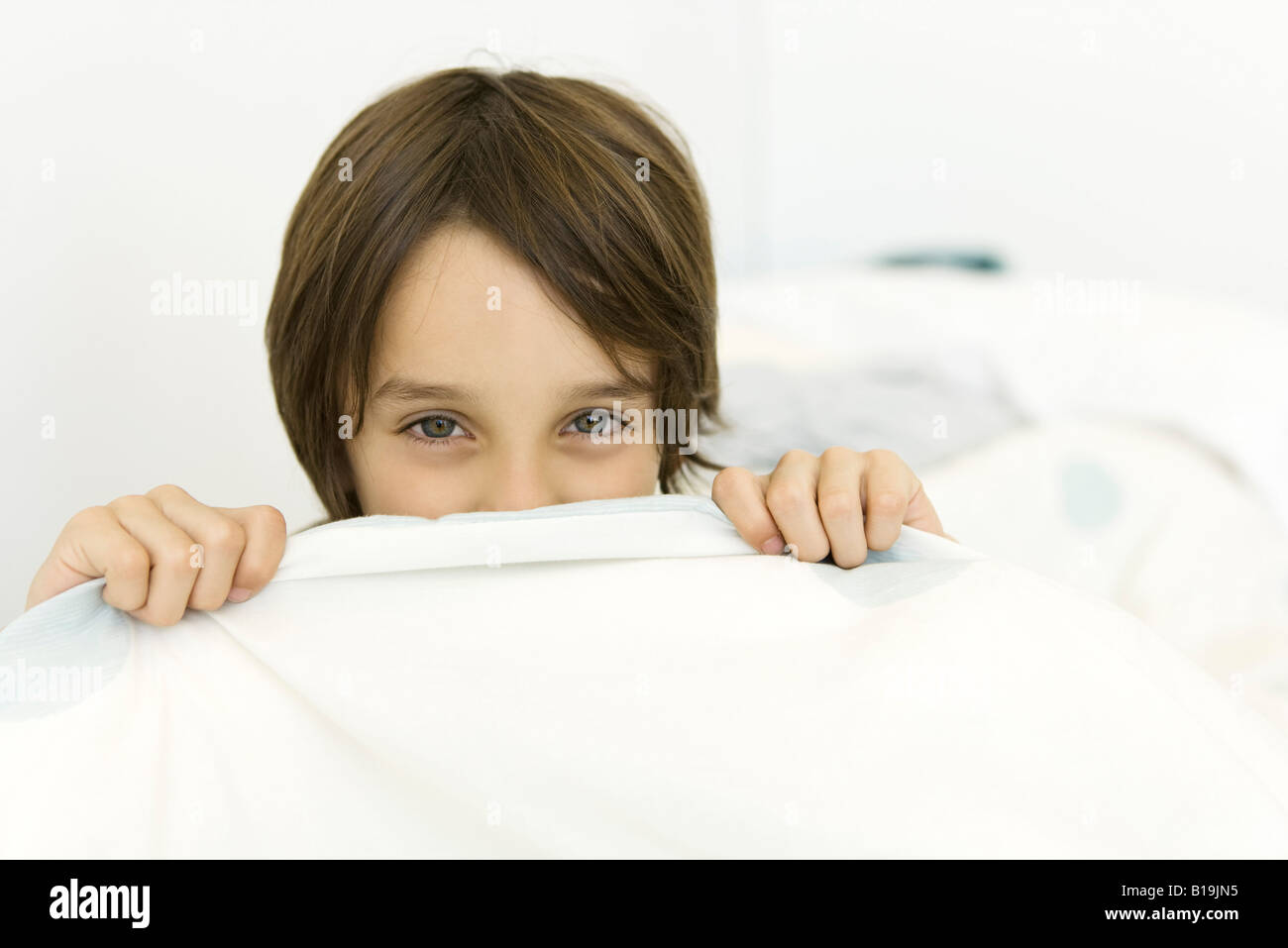 Kid pulling blanket hires stock photography and images Alamy