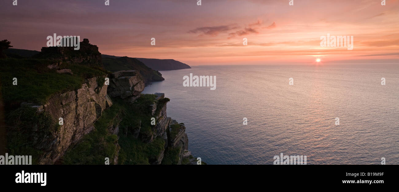 Sunset over the Bristol Channel from the Valley of Rocks, Lynton, Exmoor National Park, Devon, England, UK Stock Photo