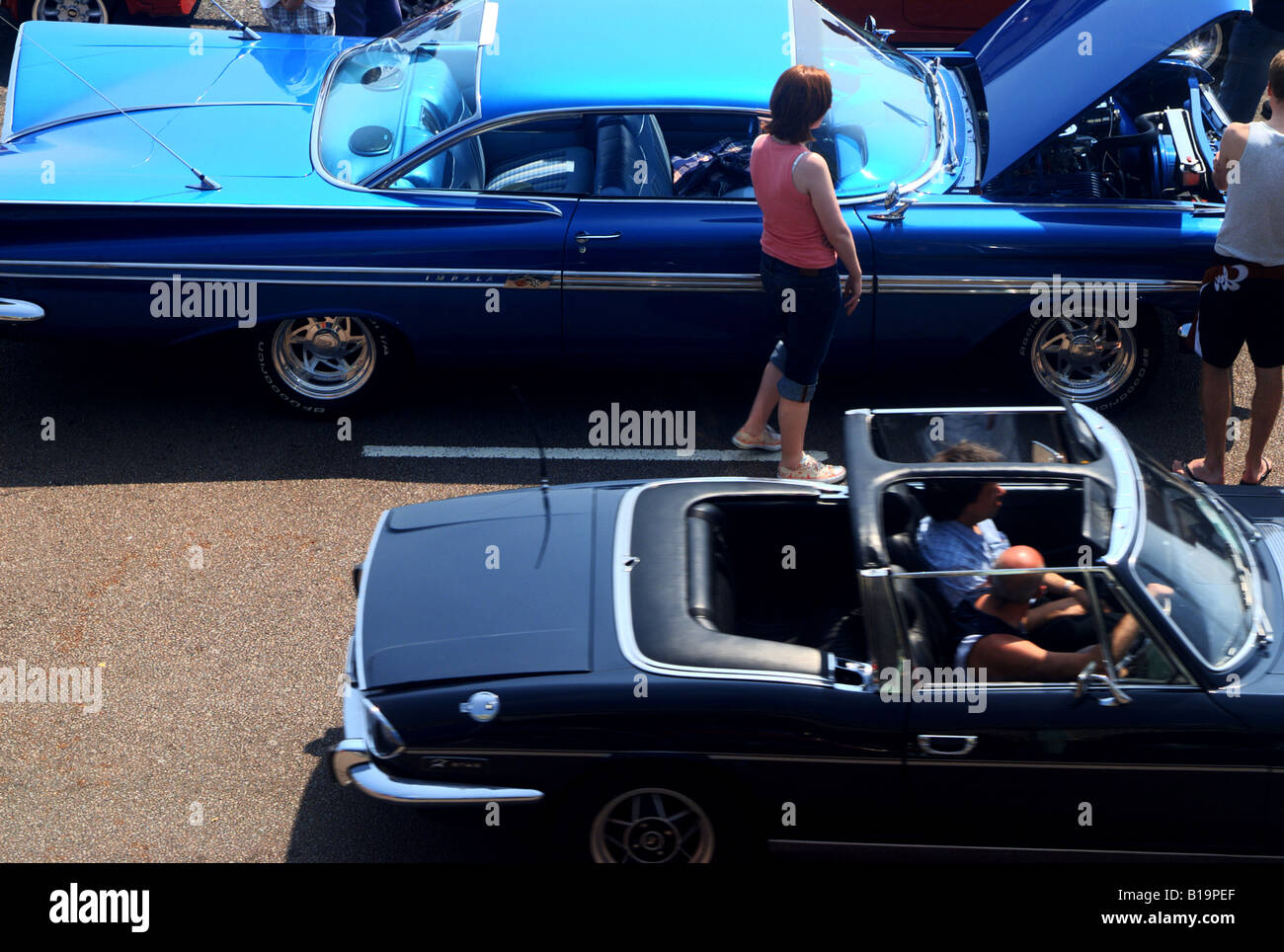 Vintage cars lined up in the road at a classic car show in Brighton. Stock Photo