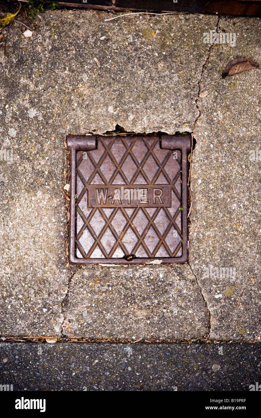 Man hole cover - water company access. UK Stock Photo