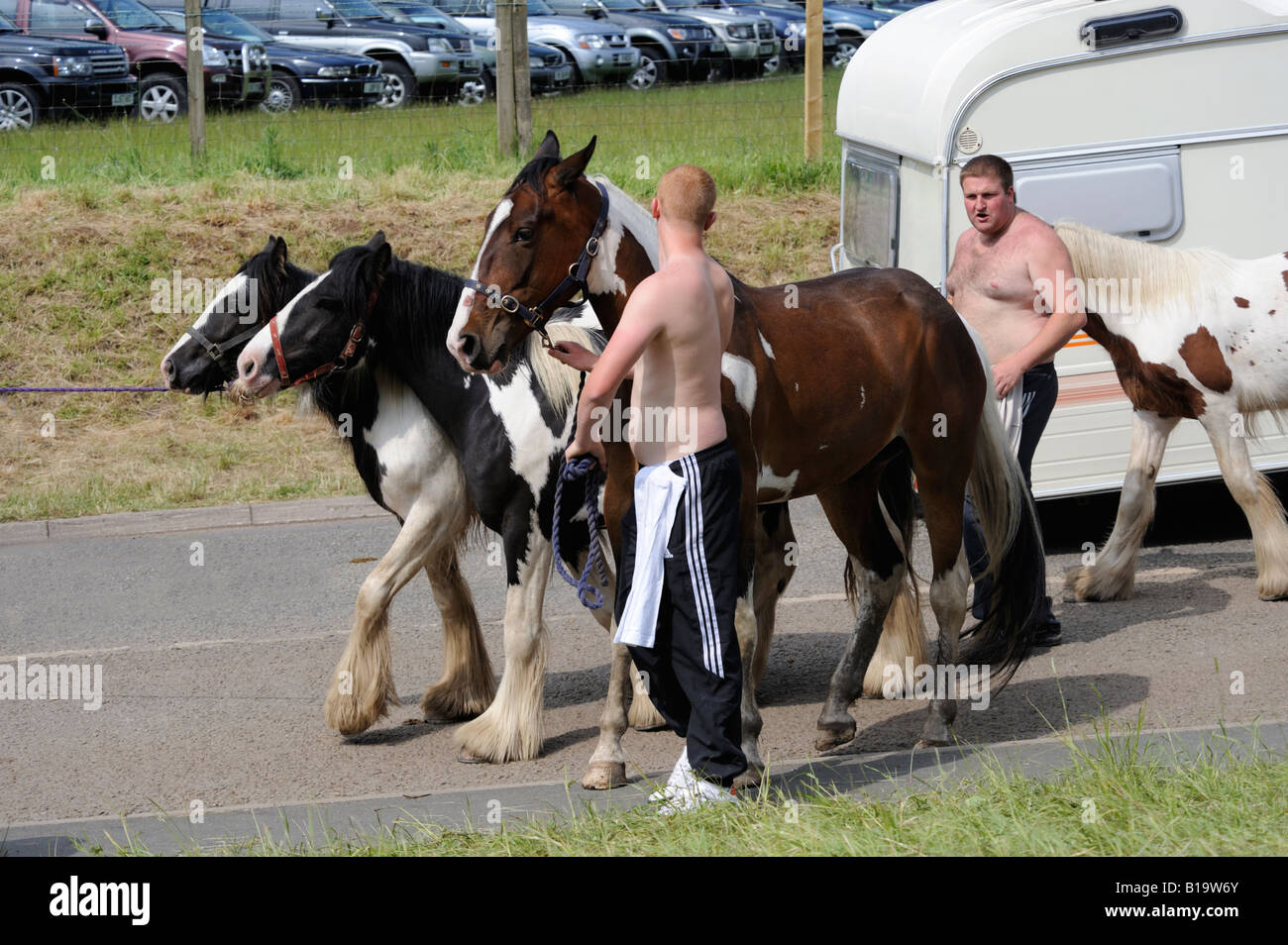 Gypsy travellers leading horses. Appleby Horse Fair. Appleby-in-Westmorland, Cumbria, England, United Kingdom, Europe. Stock Photo