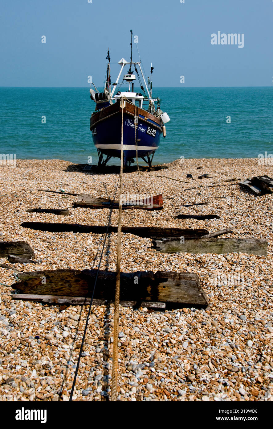 A fishing boat beached at Dungeness in Kent Stock Photo - Alamy