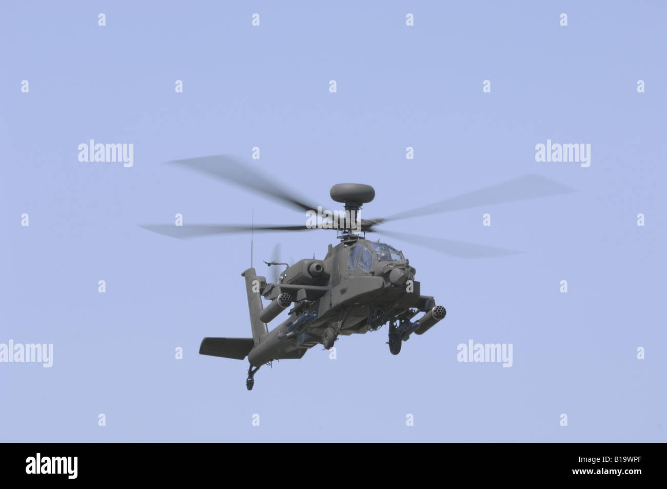 Apache AH1 Attack Helicopter in flight, hovering in the air. Stock Photo