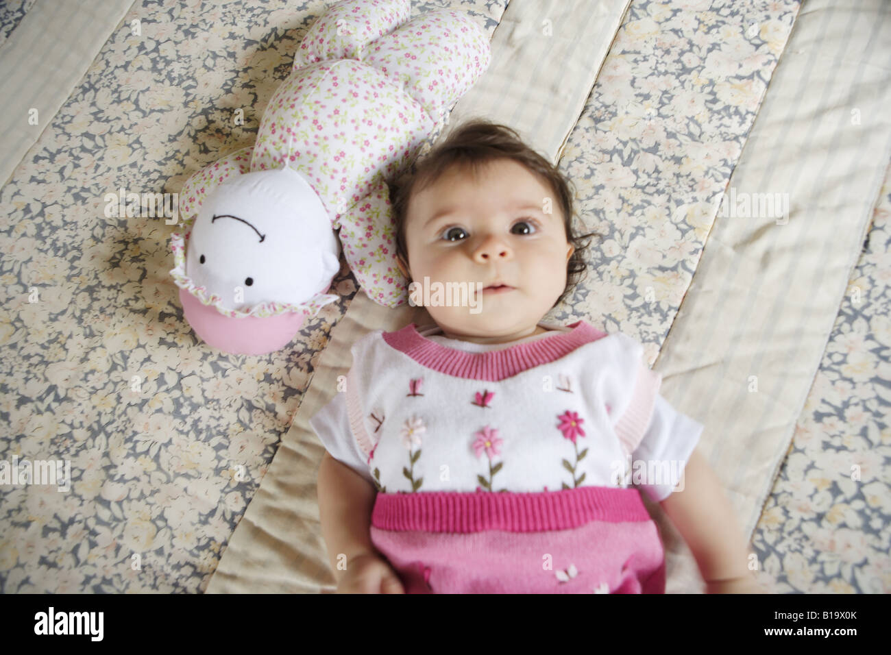 baby with rag doll Stock Photo - Alamy