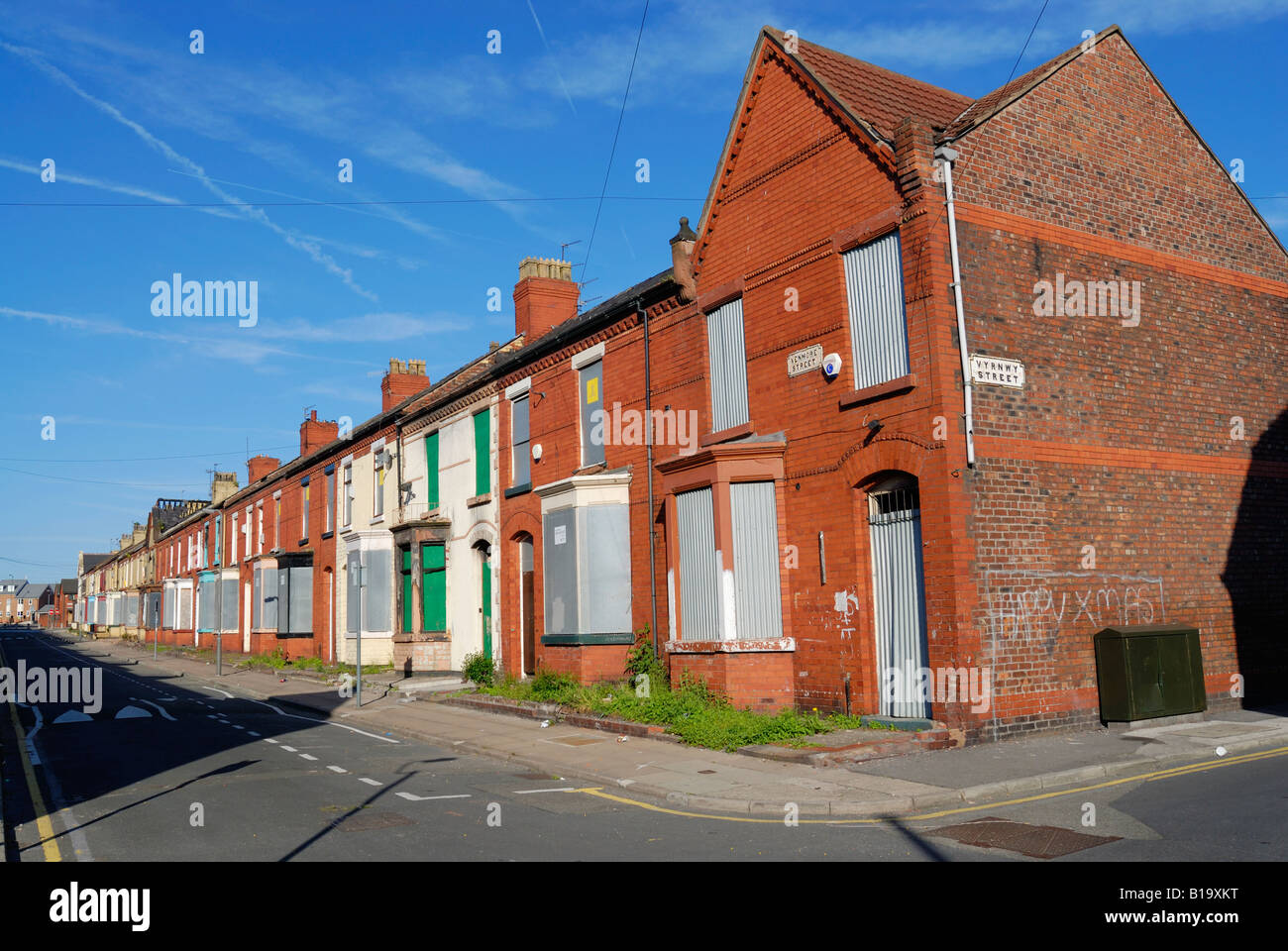 Housing in Venmore Road in the Anfield district of Liverpool boarded up ready for redevelopment. Stock Photo