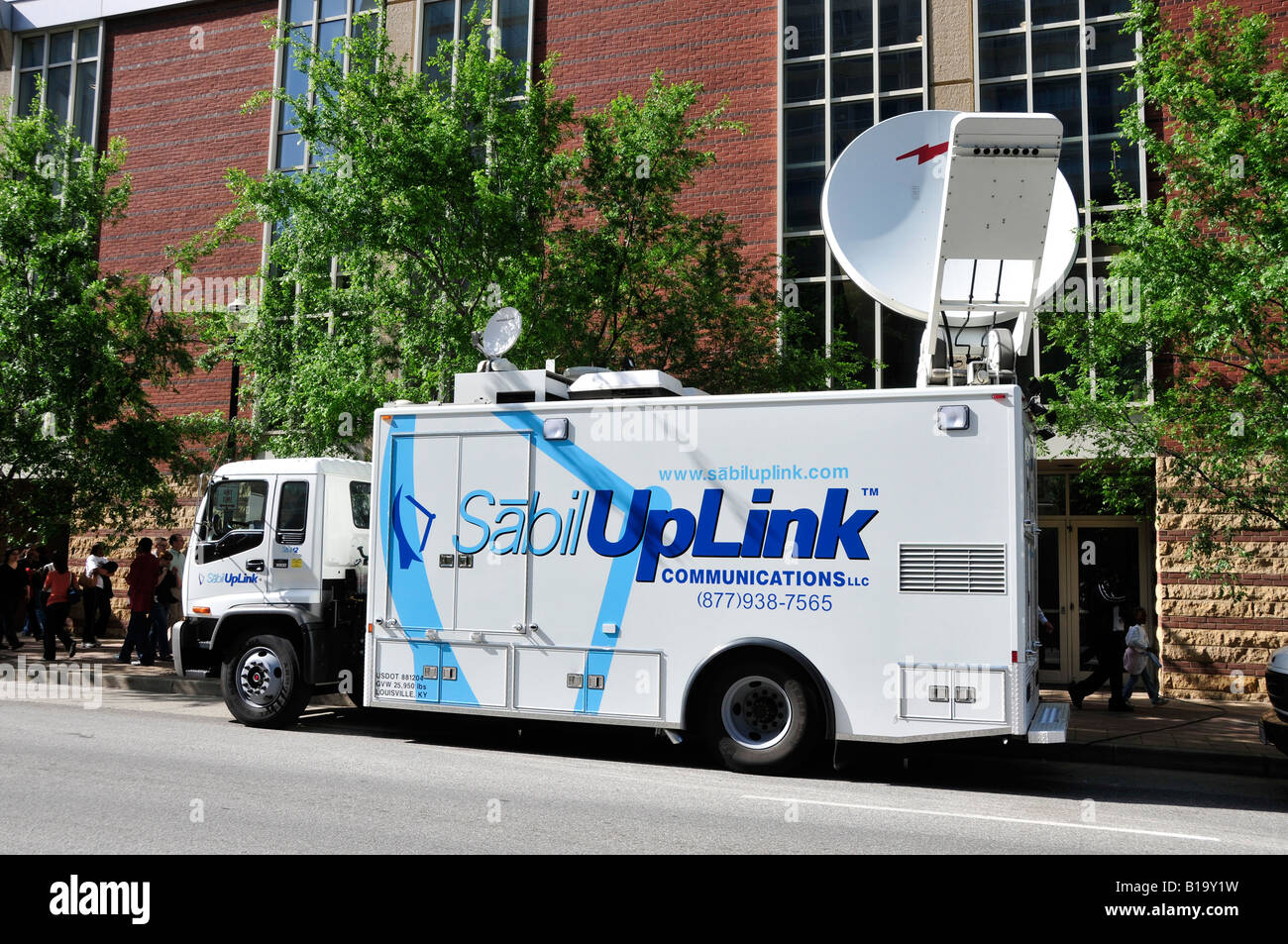 Uplink satellite communications transmission dish on a mobile TV truck in Louisville Kentucky KY Stock Photo