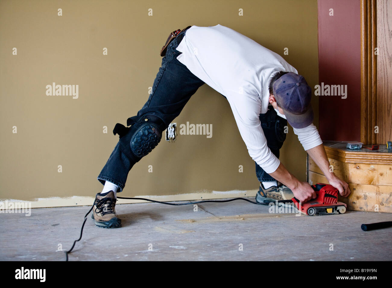 Man Working On A Floor Stock Photo Alamy