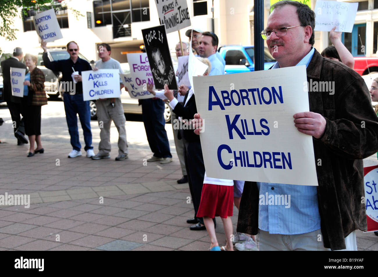 Ordinary citizen protesters protest taxes and other government wasteful spending Stock Photo
