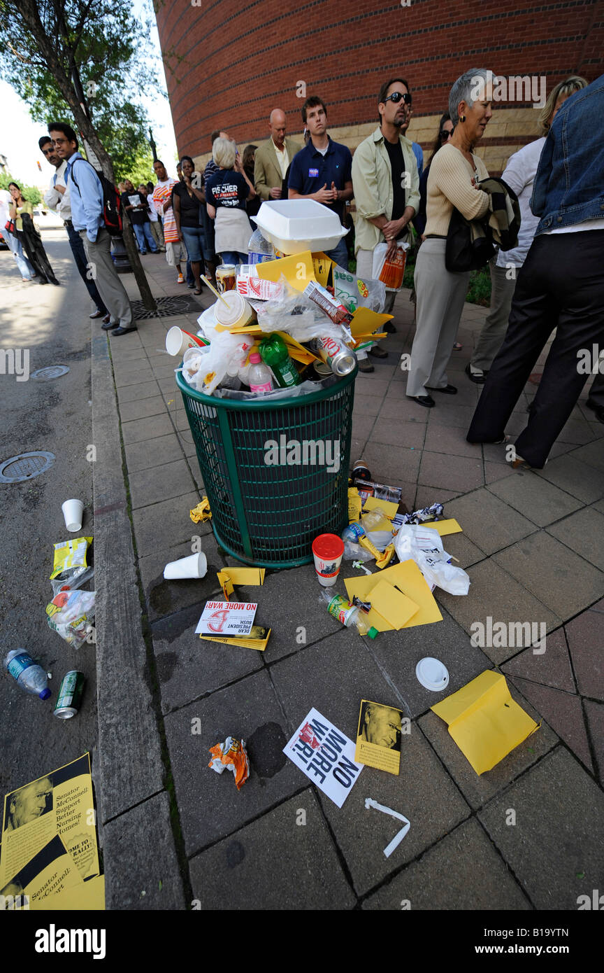 Overflowing trash bin with paper and plastic Louisville Kentucky KY