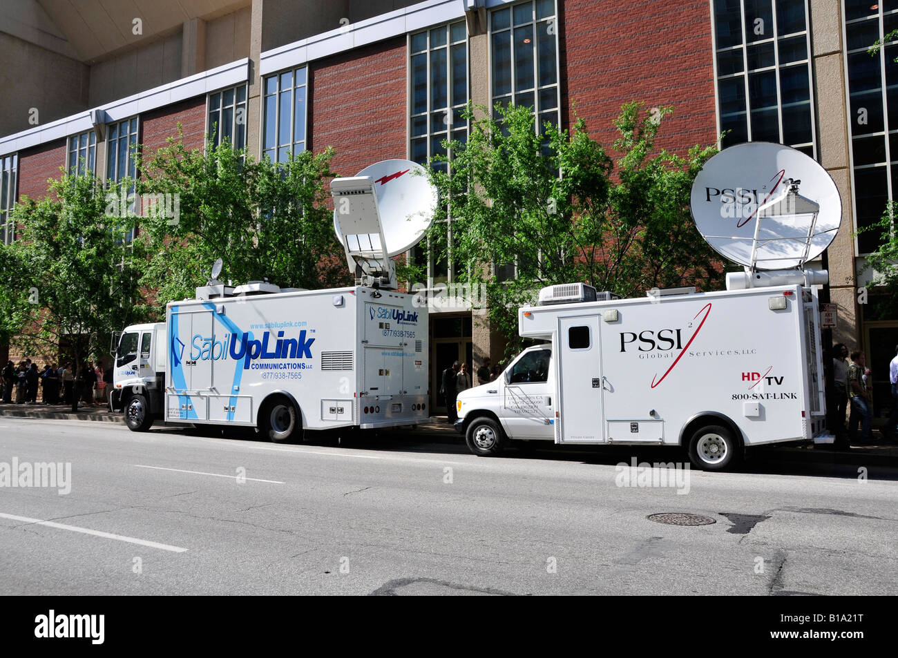 Uplink satellite communications transmission dish on a mobile TV truck