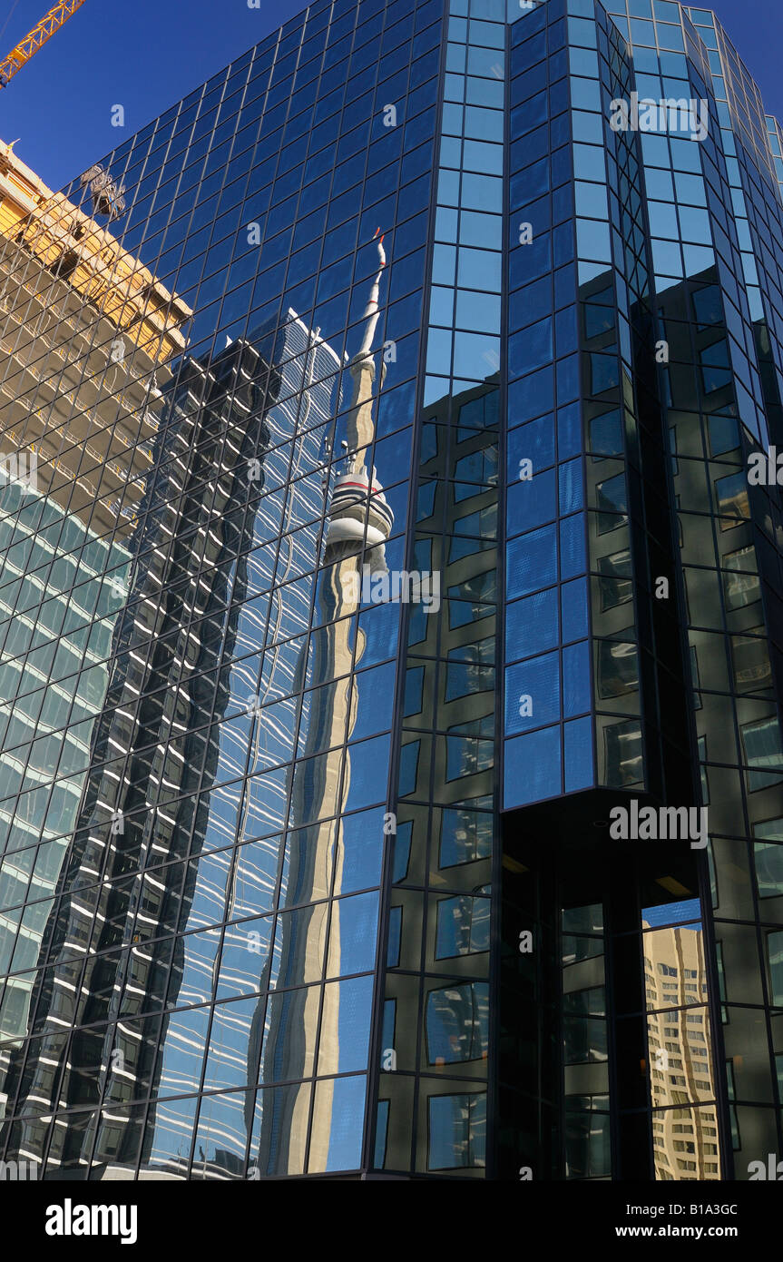 Reflection of Toronto highrise development and CN tower in glass skyscrapers Stock Photo