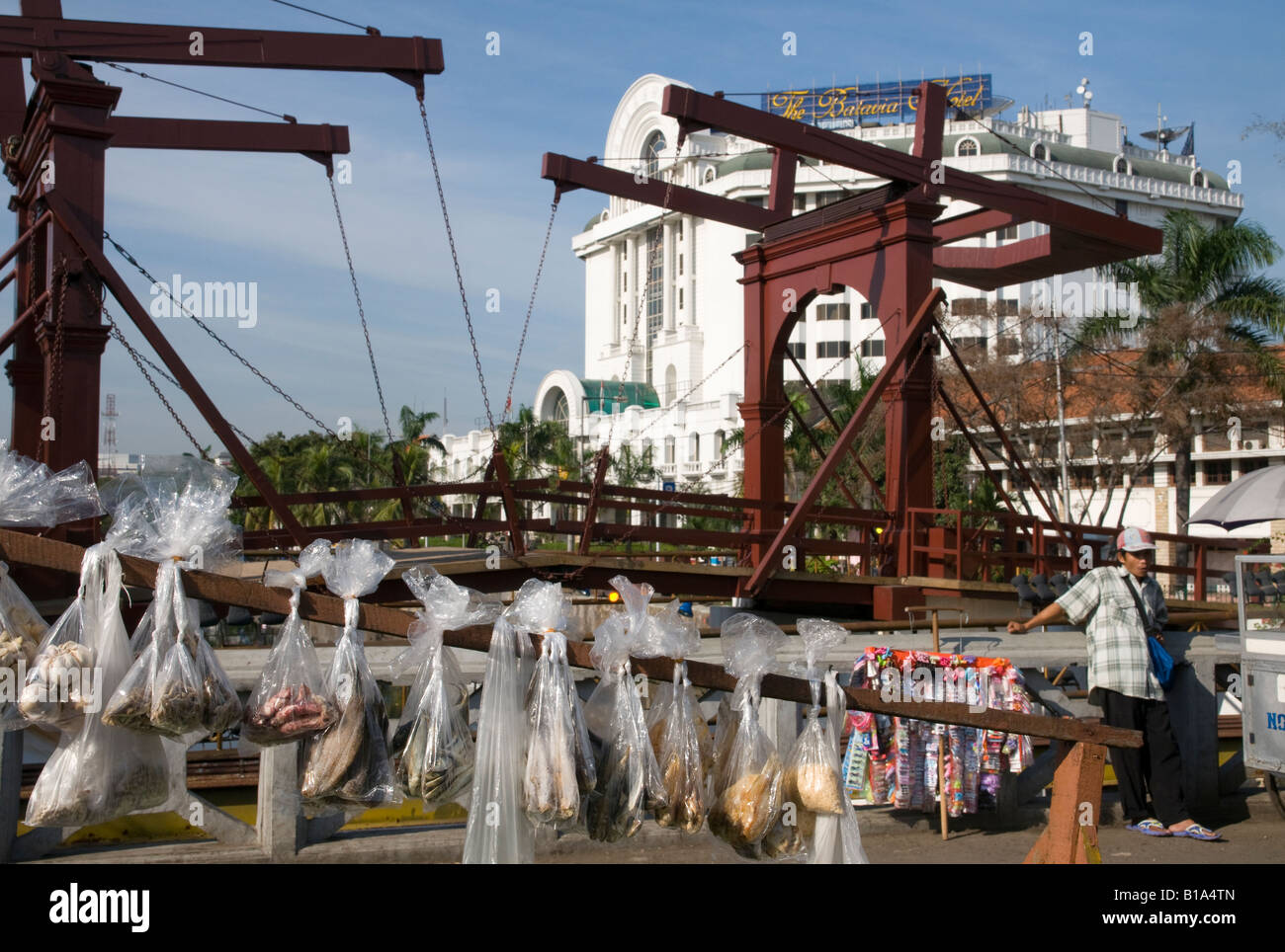 Indonesia Java Island Jakarata Batavia Chicken Market drawbridge view with hanging plastique bags in frgd and batavia hotel Stock Photo