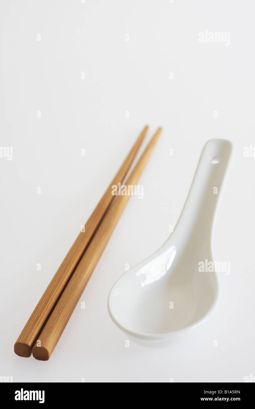 Chinese Soup Spoon With Chopsticks Stock Photo