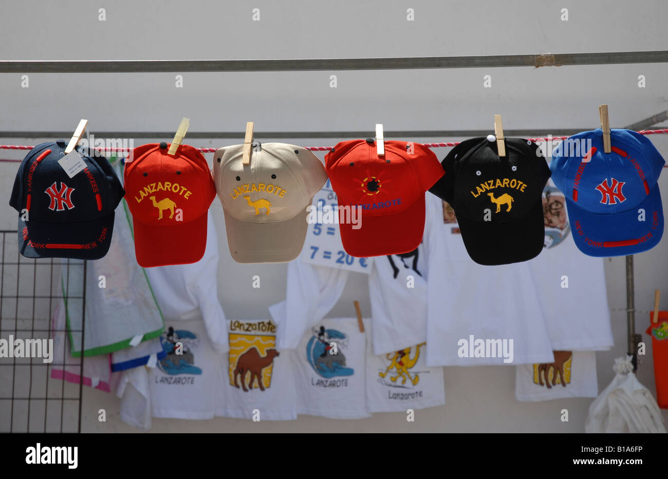 Colourful souvenir caps on display at the famous Sunday market in the