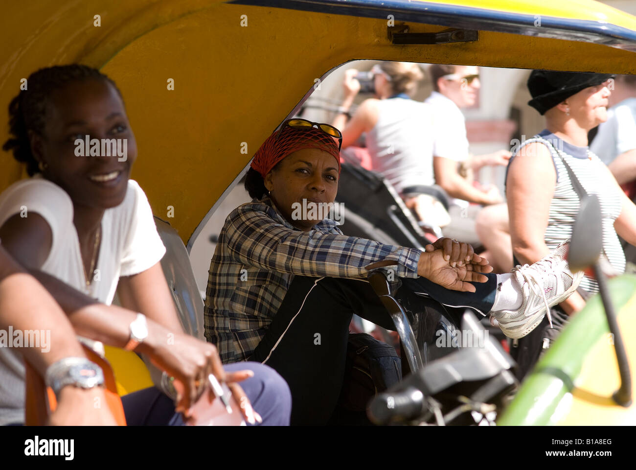 Coco taxi drivers in Havana Centro, Parque Central Stock Photo