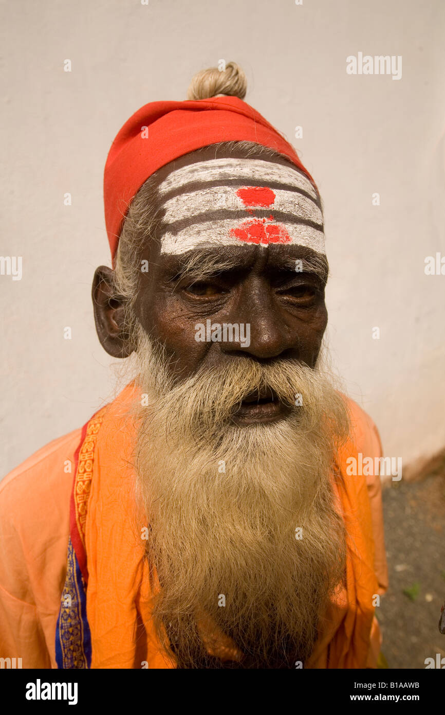 A wandering sadhu in Kerala, India. A Shiva devotee, the man has three strips, symbolic of the god, on his forehead. Stock Photo
