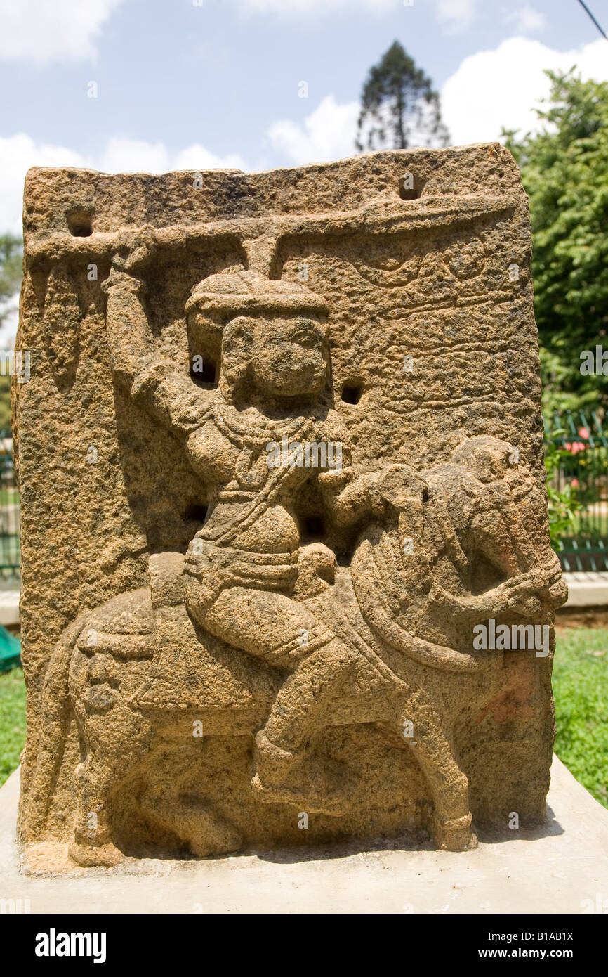 The sculpture of a warrior outside of the Venkatappa Art Gallery and