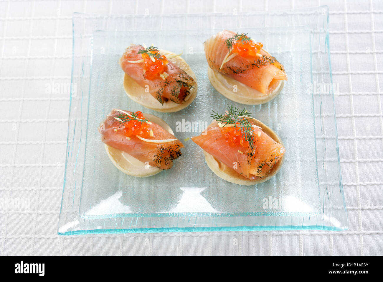 Blinis with marinated salmon and roe (zhenital Stock Photo - Alamy