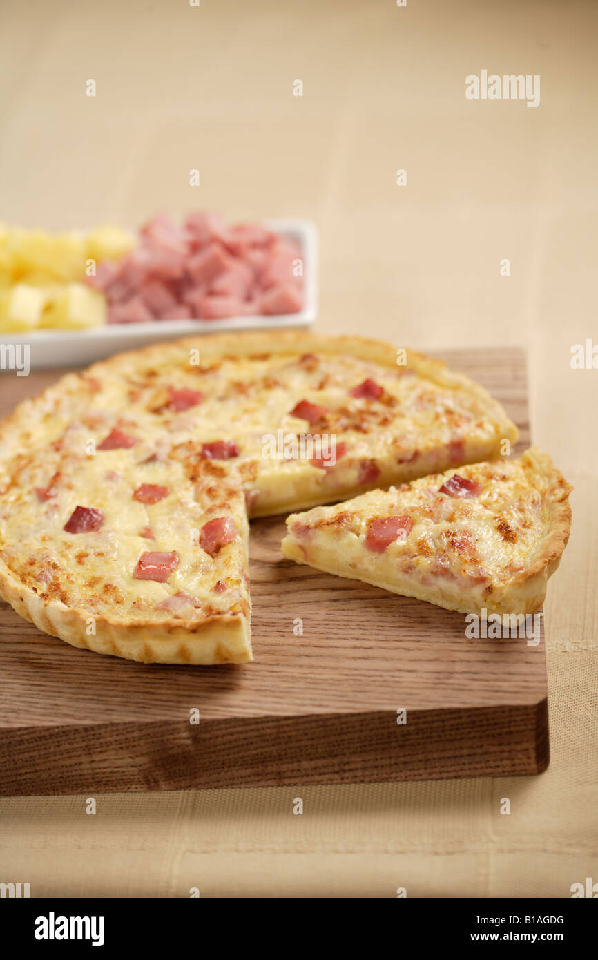 A slice of ham, bacon and cheese quiche Stock Photo Alamy