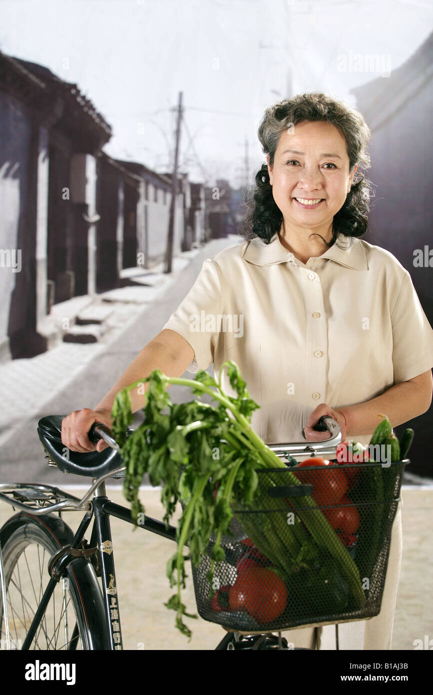Traditional chinese old woman Cut Out Stock Images & Pictures - Alamy