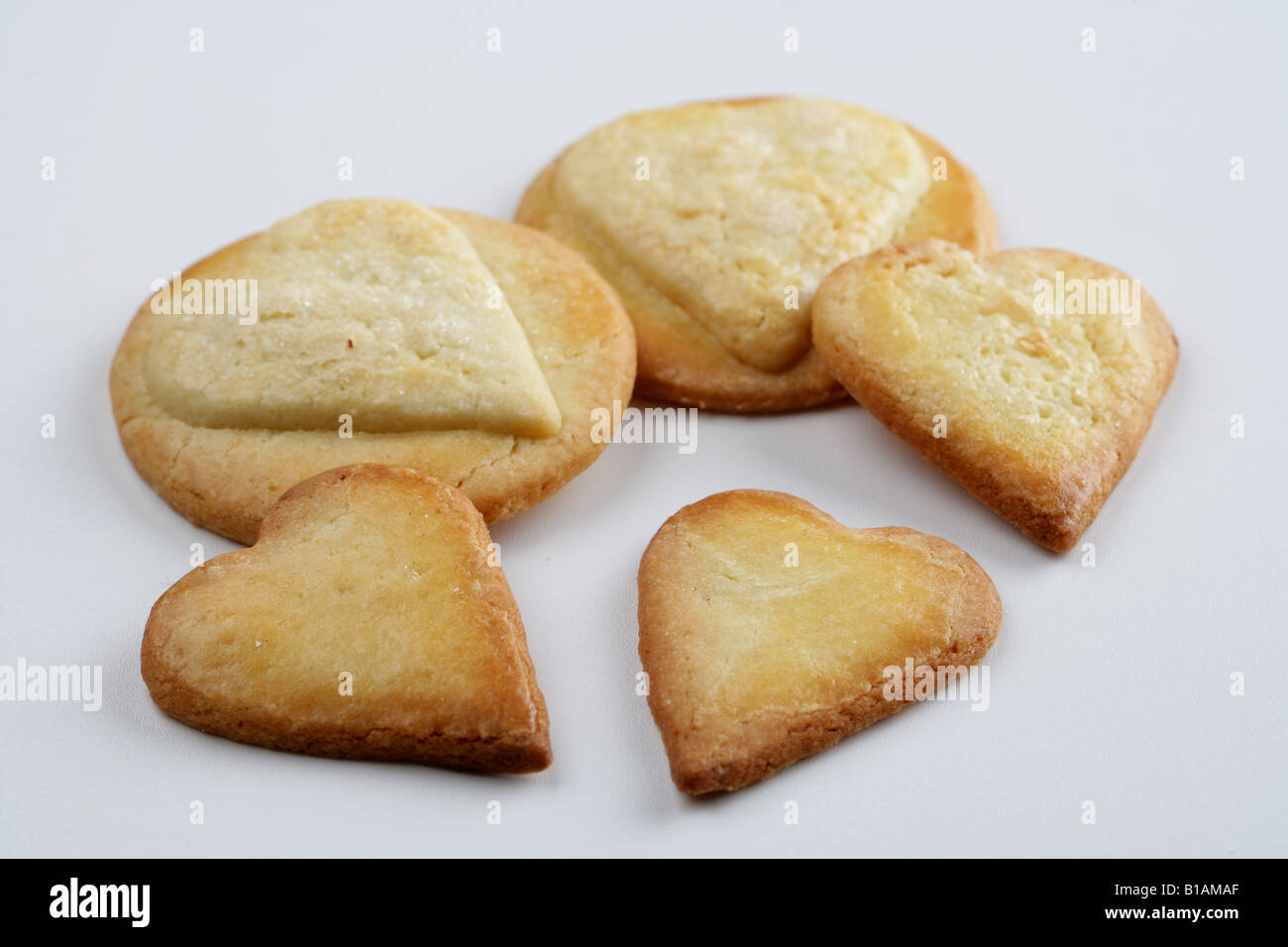 Heartshaped butter cookies on white background Stock Photo Alamy