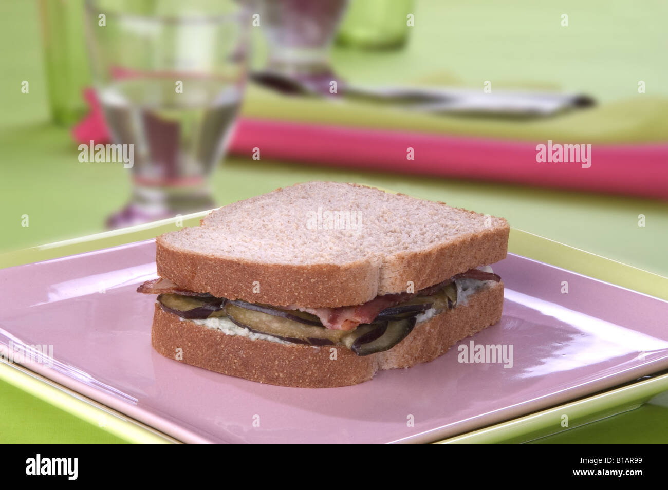 Aubergine, blue cheese, and bacon sandwich Stock Photo Alamy