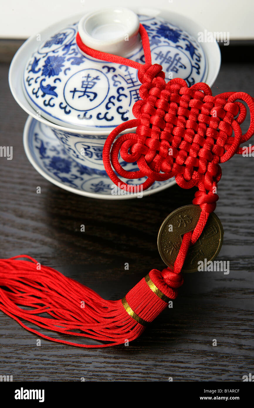 teacup and chinese knot Stock Photo Alamy