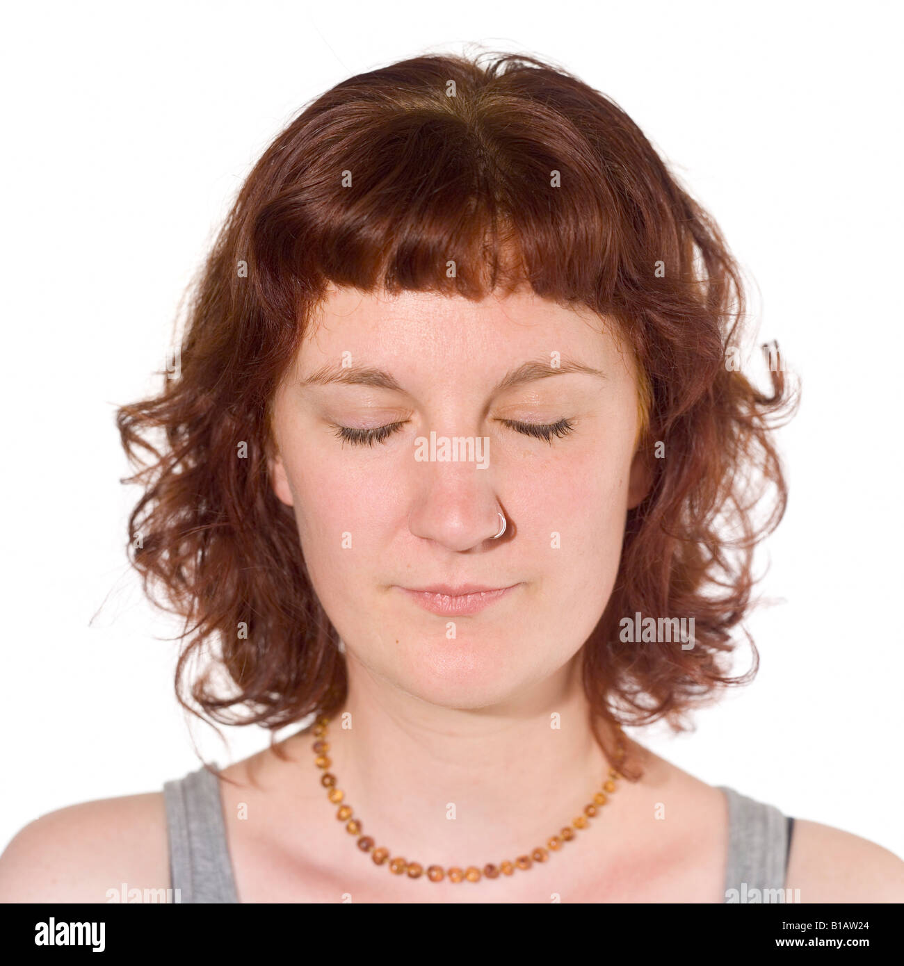 Portrait of a young woman, eyes closed Stock Photo - Alamy