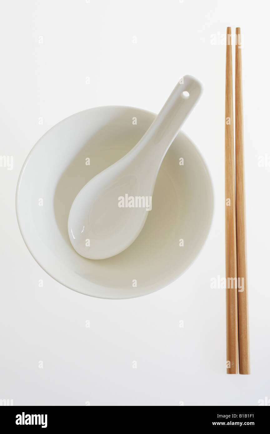 Chinese Soup Spoon In White Bowl With Chopsticks Stock Photo Alamy